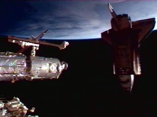 Screenshot of NASA TV showing Endeavour docking with ISS